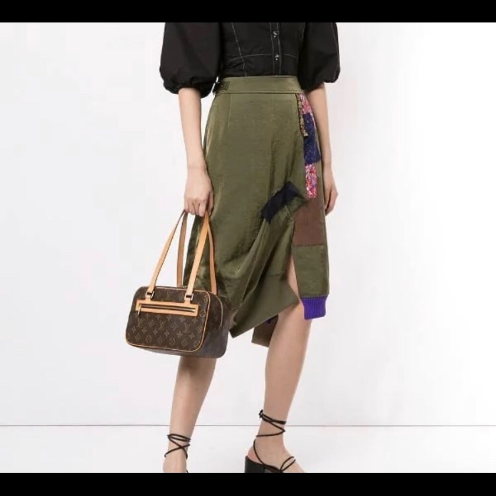 Guarantees Authentic LV MM Cite